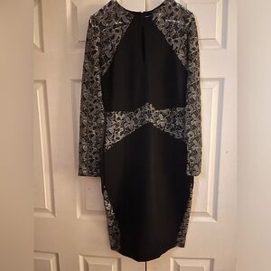 Black & gold  fitted dress with lace see through sleeves side & midsection!